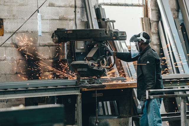 Industrial machine cutting steel materials with high precision