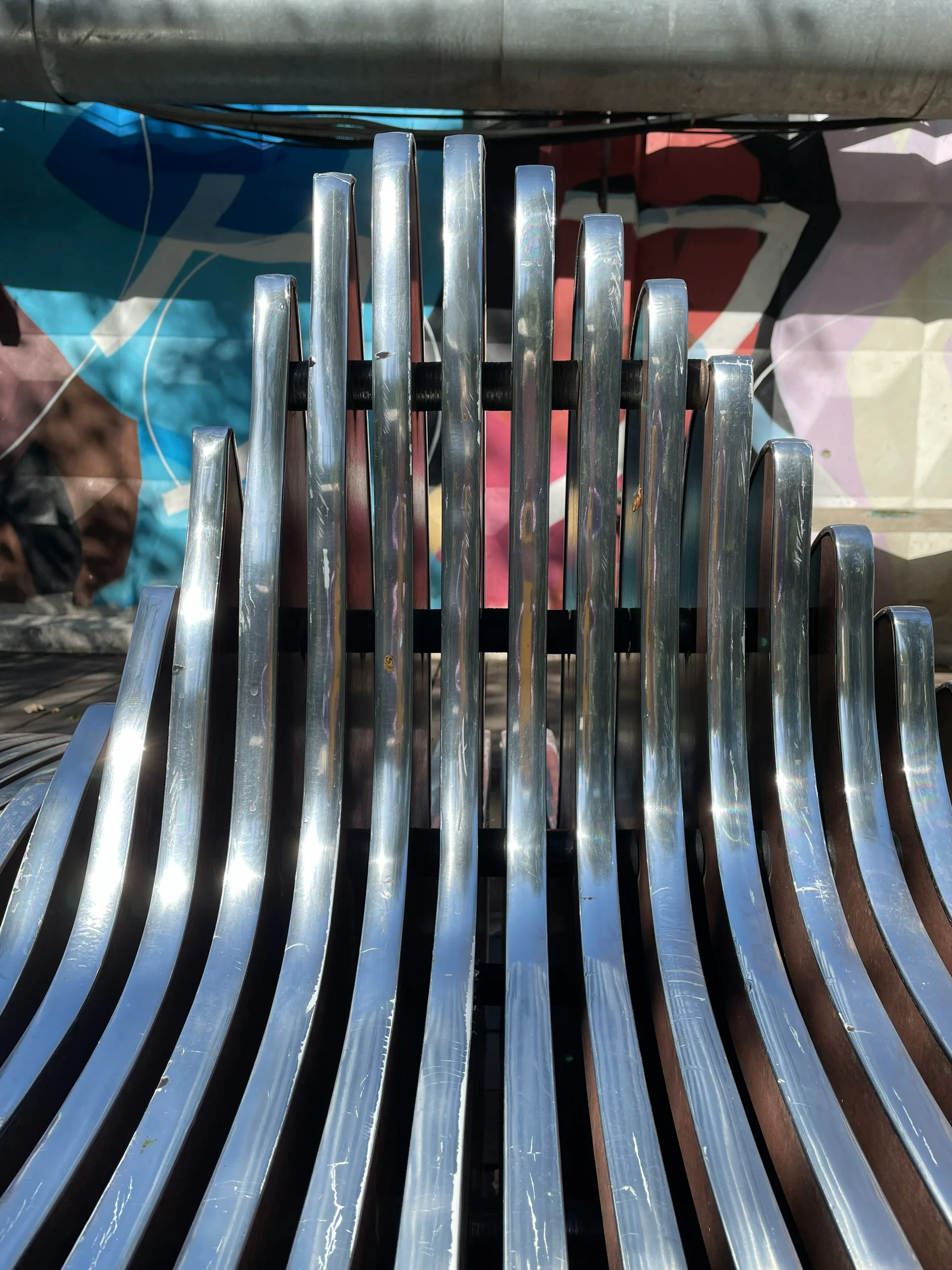 Structural steel sections being bent for construction and infrastructure projects