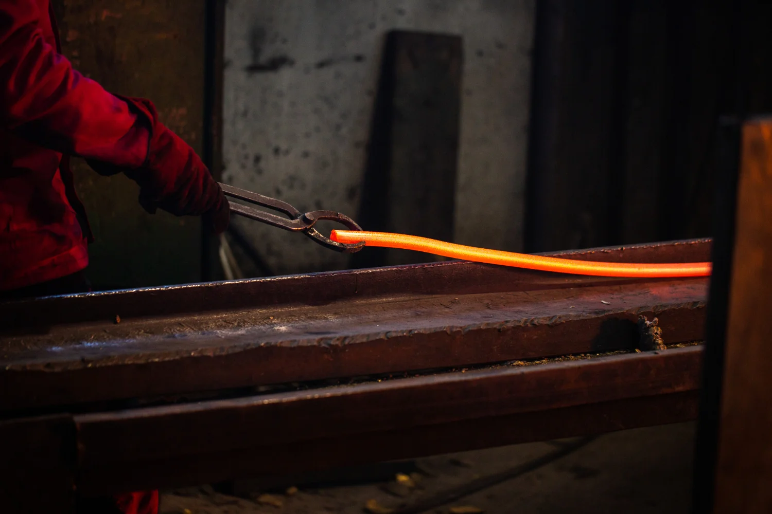 Custom steel bending service creating shaped metal components