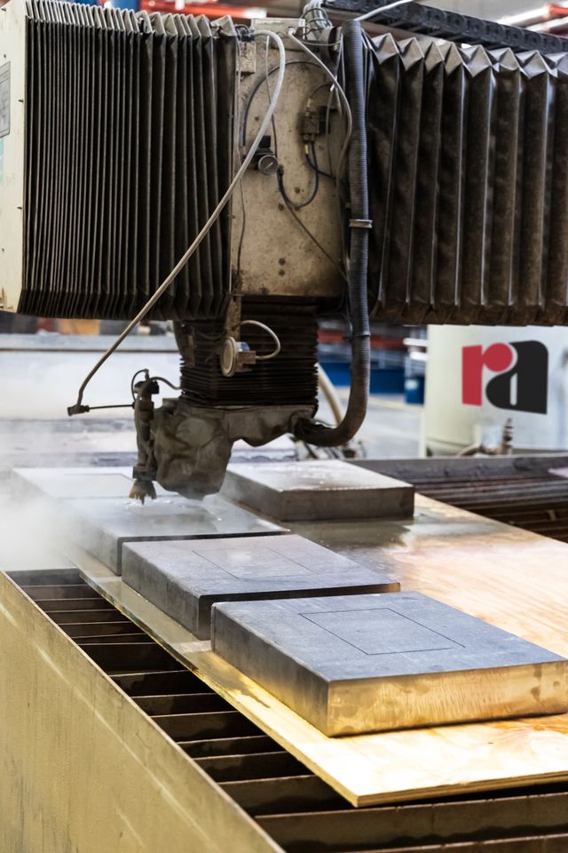 CNC laser cutting machine creating precision metal parts