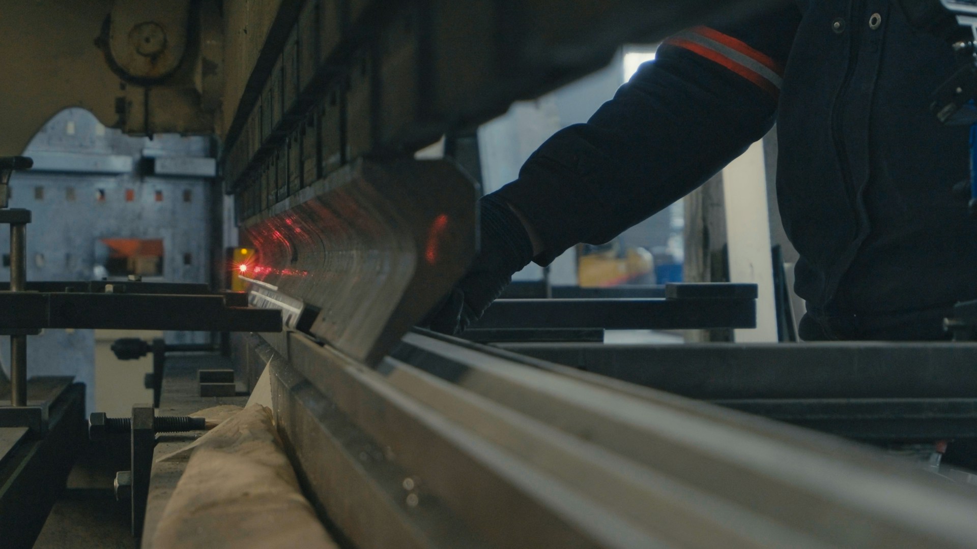 High-precision steel sheet shearing process in a fabrication facility