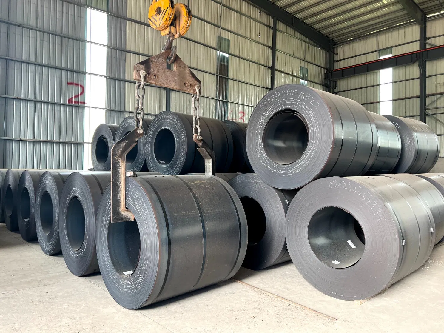 Mild steel coils stored in a warehouse